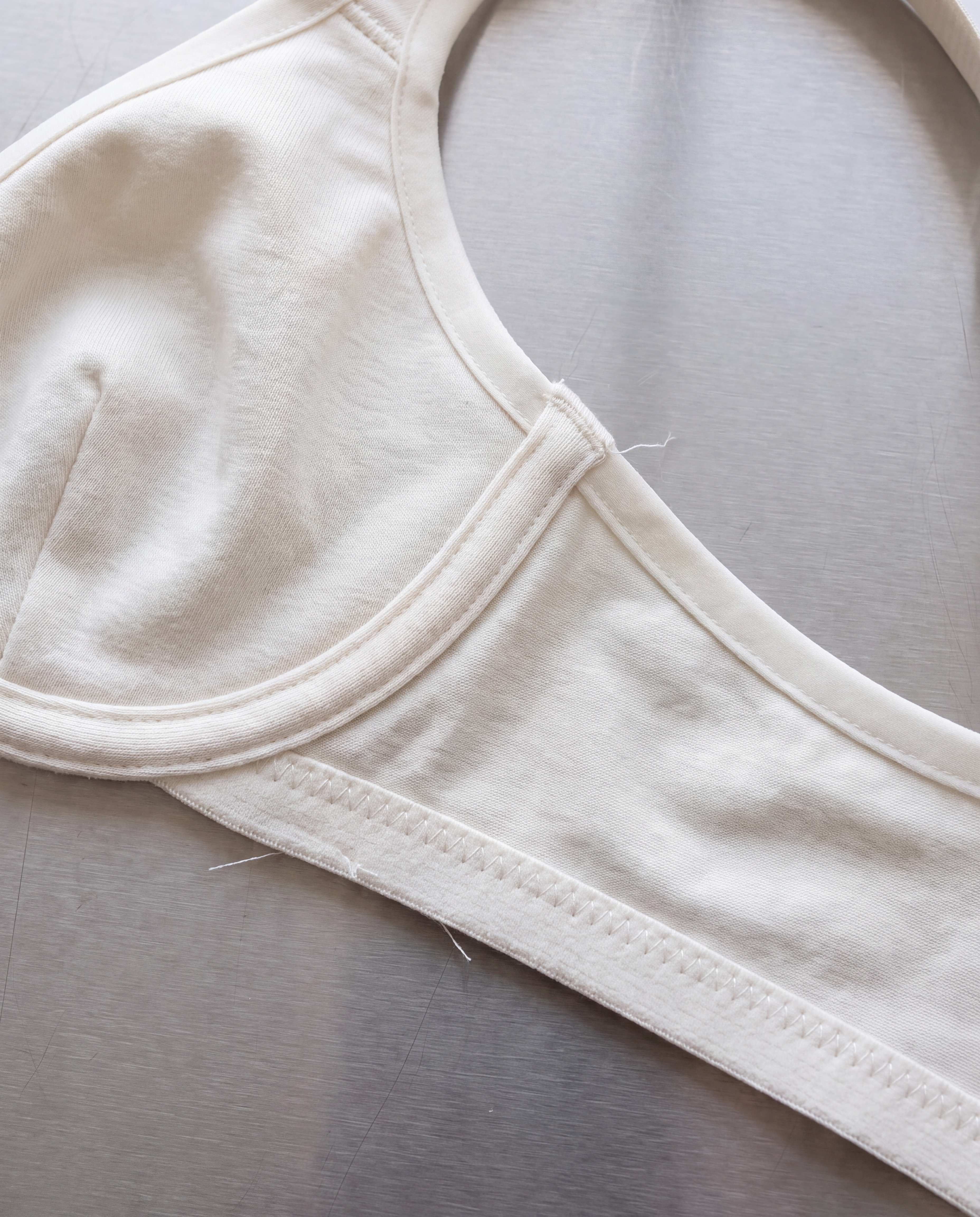 Macro detail of bonded and coverstitch seam construction